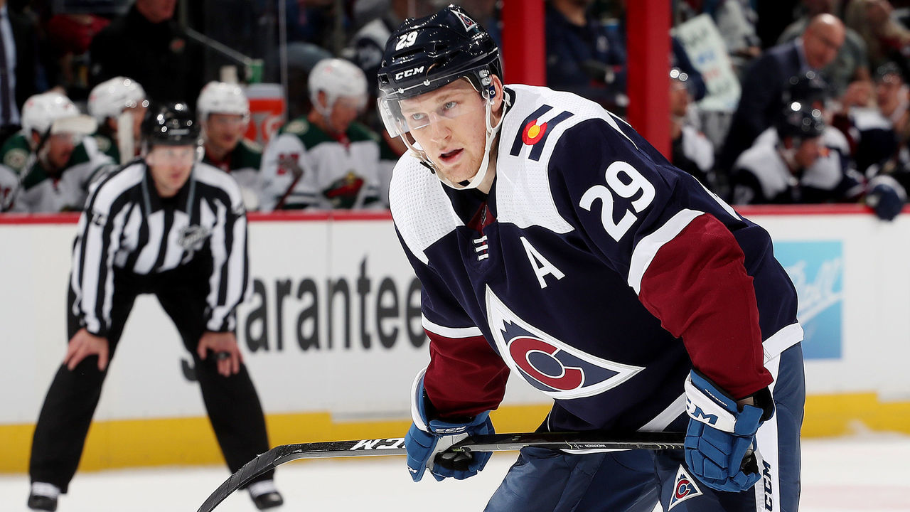 DENVER, COLORADO - OCTOBER 30: Nathan MacKinnon #29 of the Colorado Avalanche awaits a face-off against the Minnesota Wild at Ball Arena on October 30, 2021 in Denver, Colorado.