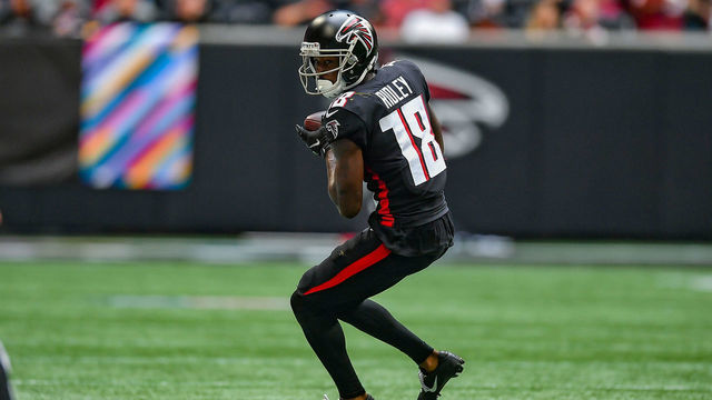 ATLANTA, GA OCTOBER 03: Atlanta wide receiver Calvin Ridley (18) turns upfield after catching a pass during the NFL game between the Washington Football Team and the Atlanta Falcons on October 3rd, 2021 at Mercedes-Benz Stadium in Atlanta, GA.