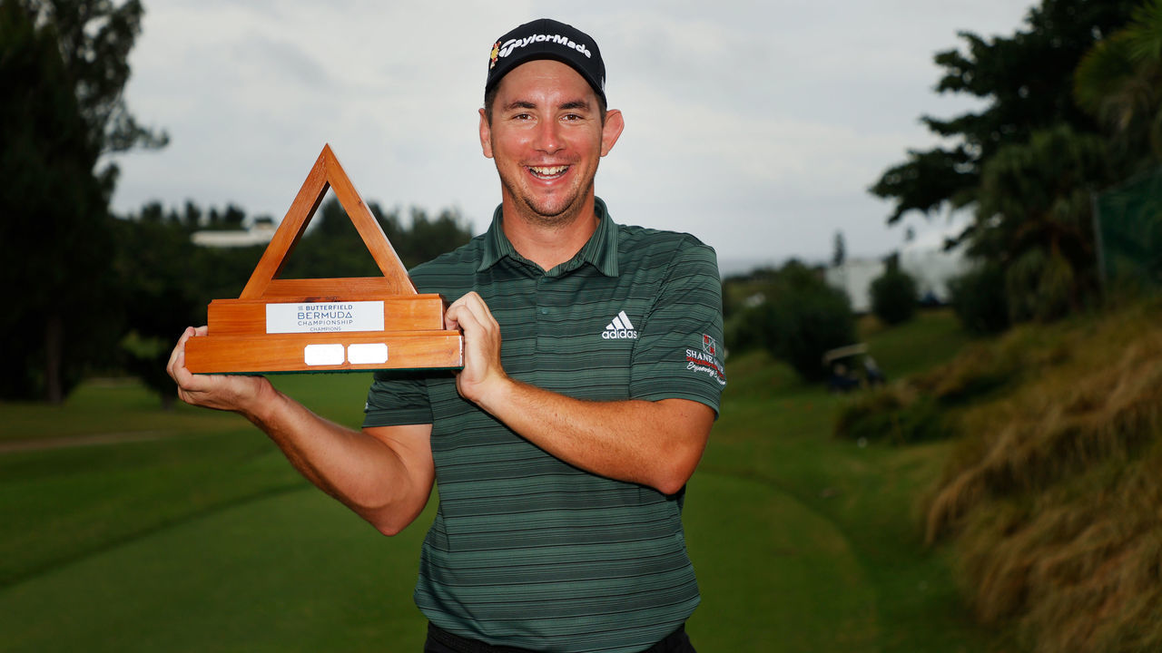 SOUTHAMPTON, BERMUDA - OCTOBER 31: Lucas Herbert of Australia poses with the trophy after winning the Butterfield Bermuda Championship at Port Royal Golf Course on October 31, 2021 in Southampton, Bermuda.
