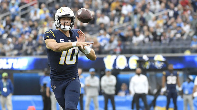 INGLEWOOD, CALIFORNIA - OCTOBER 31: Justin Herbert #10 of the Los Angeles Chargers throws a pass in the first quarter against the New England Patriots at SoFi Stadium on October 31, 2021 in Inglewood, California.