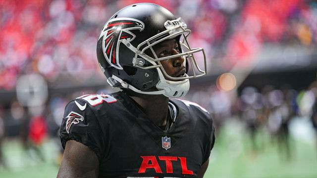 ATLANTA, GA OCTOBER 03: Atlanta wide receiver Calvin Ridley (18) looks into the crowd while walking off the field following the conclusion of the NFL game between the Washington Football Team and the Atlanta Falcons on October 3rd, 2021 at Mercedes-Benz Stadium in Atlanta, GA.