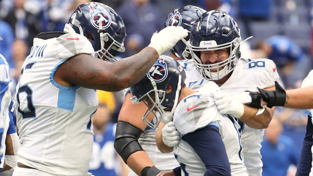 INDIANAPOLIS, INDIANA - OCTOBER 31: Randy Bullock #14 of the Tennessee Titans celebrates with teammates after kicking the game winning field goal during overtime against the Indianapolis Colts at Lucas Oil Stadium on October 31, 2021 in Indianapolis, Indiana.
