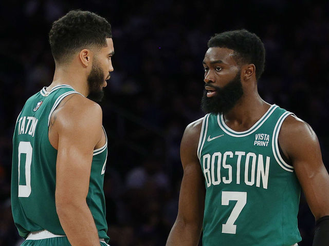 NEW YORK, NEW YORK - OCTOBER 20: Jaylen Brown #7 talks with Jayson Tatum #0 of the Boston Celtics during the second half against the New York Knicks at Madison Square Garden on October 20, 2021 in New York City. The Knicks won 138-134.