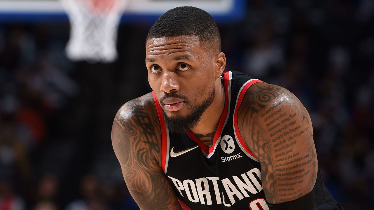 PHILADELPHIA, PA - NOVEMBER 1: Damian Lillard #0 of the Portland Trail Blazers looks on during a game against the Philadelphia 76ers on November 1, 2021 at Wells Fargo Center in Philadelphia, Pennsylvania. NOTE TO USER: User expressly acknowledges and agrees that, by downloading and/or using this Photograph, user is consenting to the terms and conditions of the Getty Images License Agreement. Mandatory Copyright Notice: Copyright 2021 NBAE
