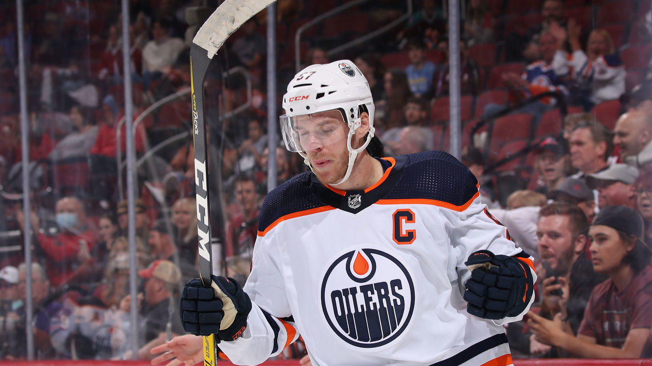 GLENDALE, ARIZONA - OCTOBER 21: Connor McDavid #97 of the Edmonton Oilers celebrates after scoring a power-play goal against the Arizona Coyotes during the third period of the NHL game at Gila River Arena on October 21, 2021 in Glendale, Arizona. The Oilers defeated the Coyotes 5-1.