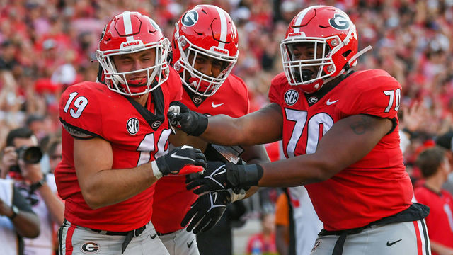 ATHENS, GA OCTOBER 16: Georgia tight end Brock Bowers (19) is congratulated by offensive lineman Warren McClendon (70) after Bowers scored a touchdown during the college football game between the Kentucky Wildcats and the Georgia Bulldogs on October 16th, 2021 at Sanford Stadium in Athens, GA.