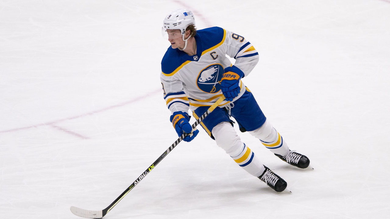 UNIONDALE, NY - MARCH 07: Buffalo Sabres Center Jack Eichel (9) skates with the puck during the third period of the National Hockey League game between the Buffalo Sabres and the New York Islanders on March 7, 2021, at the Nassau Veterans Memorial Coliseum in Uniondale, NY.