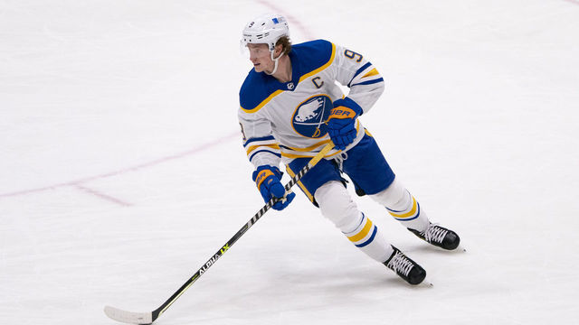 UNIONDALE, NY - MARCH 07: Buffalo Sabres Center Jack Eichel (9) skates with the puck during the third period of the National Hockey League game between the Buffalo Sabres and the New York Islanders on March 7, 2021, at the Nassau Veterans Memorial Coliseum in Uniondale, NY.