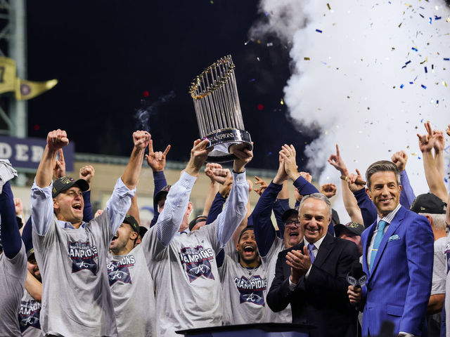 HOUSTON, TX - NOVEMBER 02: Members of the Atlanta Braves, ownership, staff and commissioner of baseball Robert D. Manfred Jr. celebrate after the Braves beat the Astros, 7-0, in Game 6 of the 2021 World Series between the Atlanta Braves and the Houston Astros at Minute Maid Park on Tuesday, November 2, 2021 in Houston, Texas