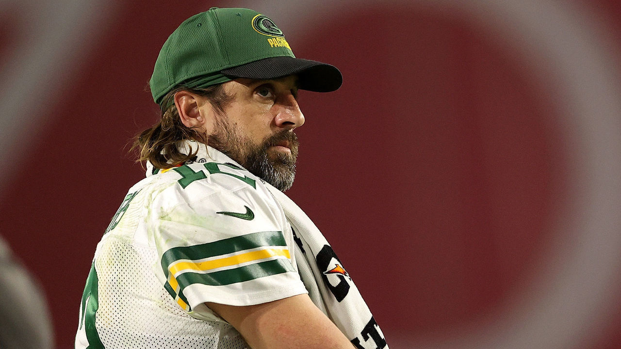 GLENDALE, ARIZONA - OCTOBER 28: Aaron Rodgers #12 of the Green Bay Packers watches action from the sideline during the second half of a game against the Arizona Cardinals at State Farm Stadium on October 28, 2021 in Glendale, Arizona.