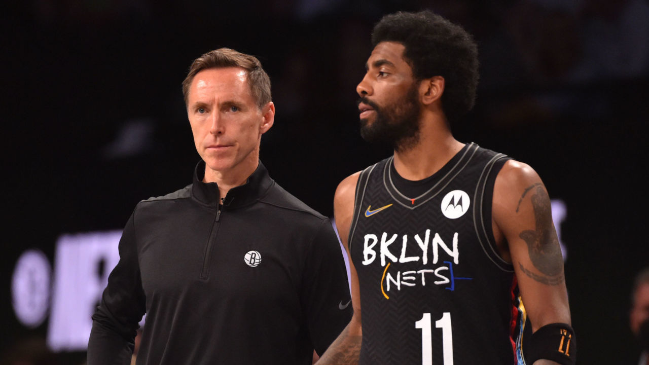 BROOKLYN, NY - JUNE 7: Head Coach Steve Nash of the Brooklyn Nets and Kyrie Irving #11 of the Brooklyn Nets look on during a game against the Milwaukee Bucks during Round 2, Game 2 on June 7, 2021 at Barclays Center in Brooklyn, New York. NOTE TO USER: User expressly acknowledges and agrees that, by downloading and/or using this Photograph, user is consenting to the terms and conditions of the Getty Images License Agreement. Mandatory Copyright Notice: Copyright 2021 NBAE