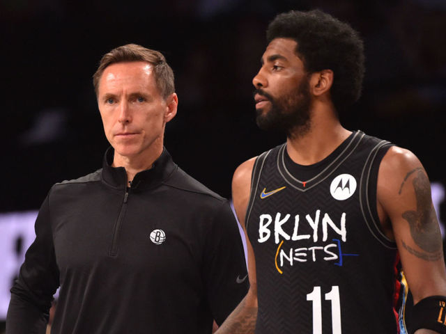 BROOKLYN, NY - JUNE 7: Head Coach Steve Nash of the Brooklyn Nets and Kyrie Irving #11 of the Brooklyn Nets look on during a game against the Milwaukee Bucks during Round 2, Game 2 on June 7, 2021 at Barclays Center in Brooklyn, New York. NOTE TO USER: User expressly acknowledges and agrees that, by downloading and/or using this Photograph, user is consenting to the terms and conditions of the Getty Images License Agreement. Mandatory Copyright Notice: Copyright 2021 NBAE