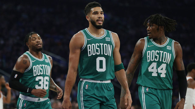 NEW YORK, NEW YORK - OCTOBER 20: Marcus Smart #36, Jayson Tatum #0, and Robert Williams III #44 of the Boston Celtics look on during the first half against the New York Knicks at Madison Square Garden on October 20, 2021 in New York City.
