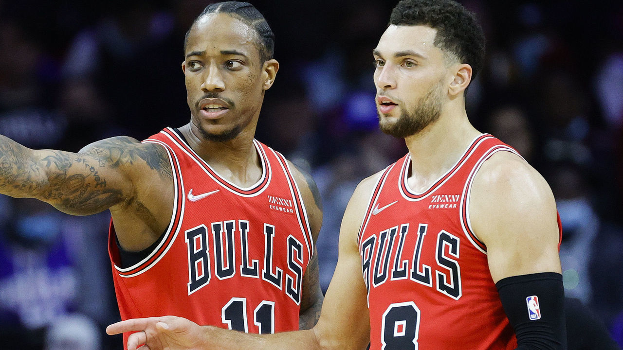 PHILADELPHIA, PENNSYLVANIA - NOVEMBER 03: DeMar DeRozan #11 and Zach LaVine #8 of the Chicago Bulls speak during the first quarter against the Philadelphia 76ers at Wells Fargo Center on November 03, 2021 in Philadelphia, Pennsylvania. NOTE TO USER: User expressly acknowledges and agrees that, by downloading and/or using this photograph, user is consenting to the terms and conditions of the Getty Images License Agreement.