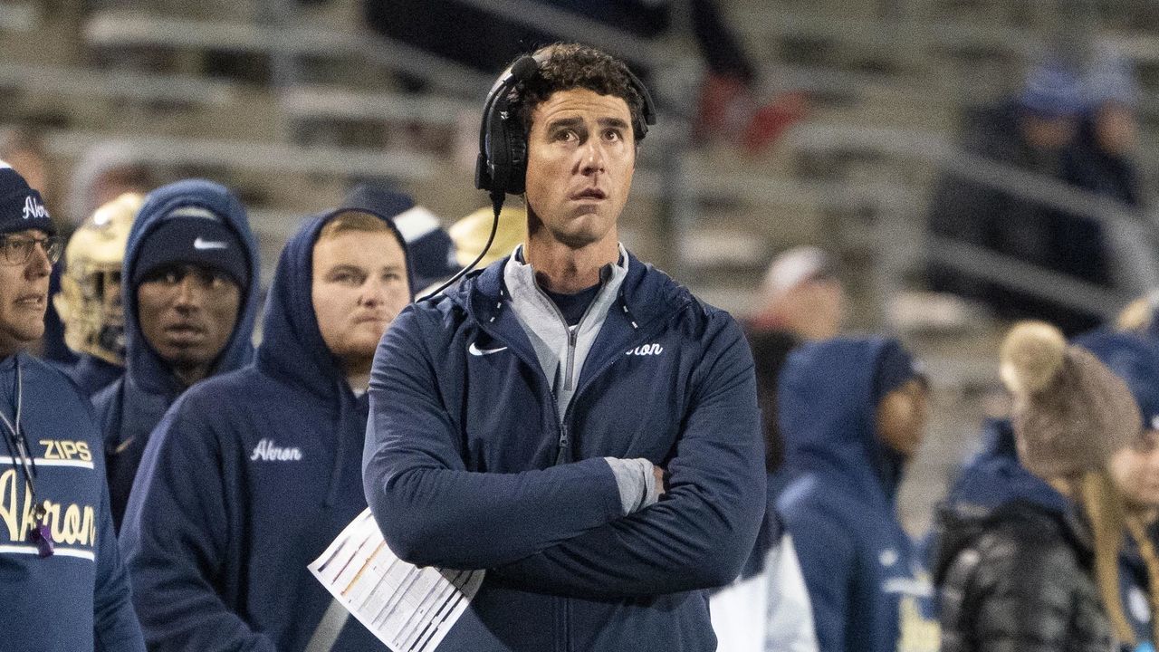 AKRON, OH - NOVEMBER 02: Akron Zips Head Coach Tom Arth looks up at the scoreboard during the first half of the College Football game between the Ball State Cardinals and the Akron Zips on November 2, 2021, at Summa Field at InfoCision Stadium in Akron, OH.