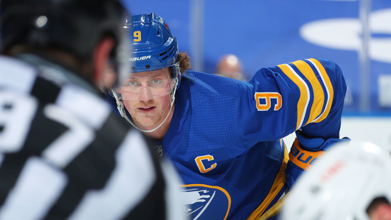 BUFFALO, NY - FEBRUARY 15: Jack Eichel #9 of the Buffalo Sabres prepares for a face-off during an NHL game against the New York Islanders on February 15, 2021 at KeyBank Center in Buffalo, New York. New York won, 3-1.