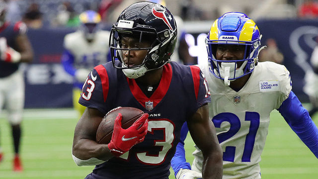 HOUSTON, TEXAS - OCTOBER 31: Brandin Cooks #13 of the Houston Texans catches a pass in the fourth quarter for a touchdown against the Los Angeles Rams at NRG Stadium on October 31, 2021 in Houston, Texas.