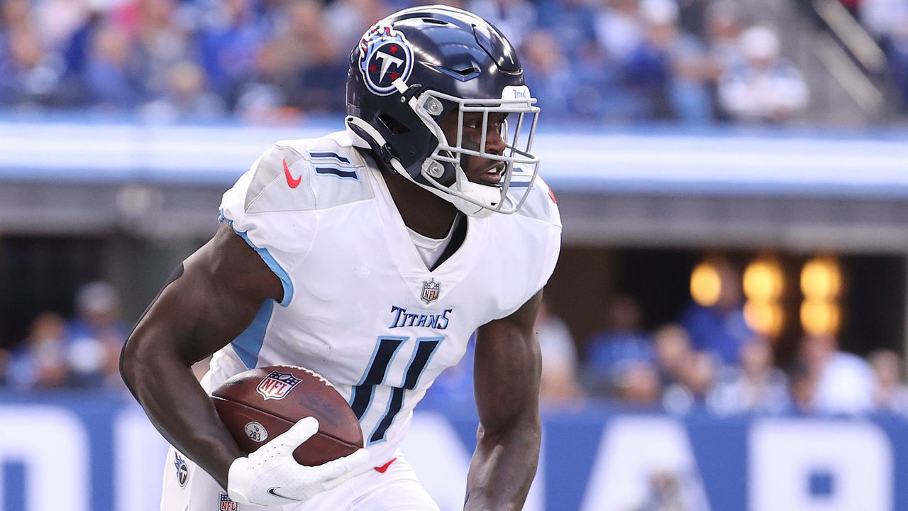 INDIANAPOLIS, INDIANA - OCTOBER 31: A.J. Brown #11of the Tennessee Titans runs for a touchdown against the Indianapolis Colts at Lucas Oil Stadium on October 31, 2021 in Indianapolis, Indiana.