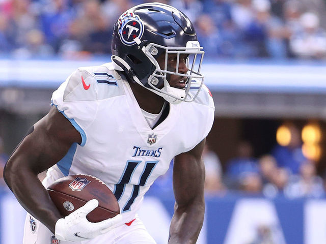 INDIANAPOLIS, INDIANA - OCTOBER 31: A.J. Brown #11of the Tennessee Titans runs for a touchdown against the Indianapolis Colts at Lucas Oil Stadium on October 31, 2021 in Indianapolis, Indiana.