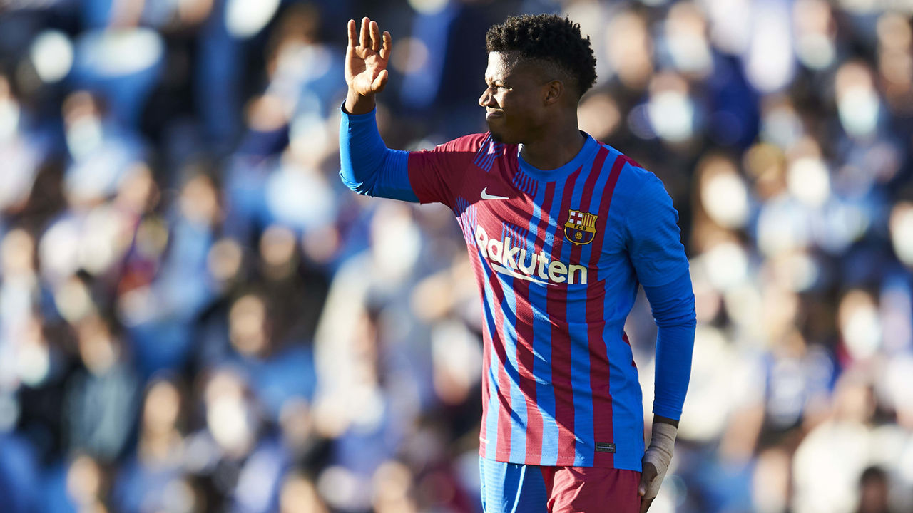 VIGO, SPAIN - NOVEMBER 06: Ansu Fati of FC Barcelona holds his hand up to call for medical attention during the La Liga Santander match between RC Celta de Vigo and FC Barcelona at Abanca-Balaídos on November 06, 2021 in Vigo, Spain.