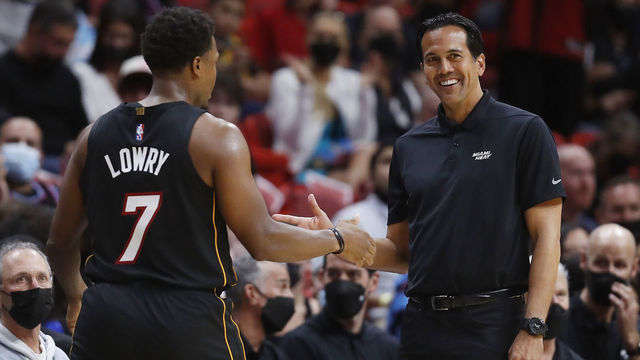 MIAMI, FLORIDA - NOVEMBER 06: Kyle Lowry #7 and head coach Erik Spoelstra of the Miami Heat high five against the Utah Jazz during the first half at FTX Arena on November 06, 2021 in Miami, Florida.