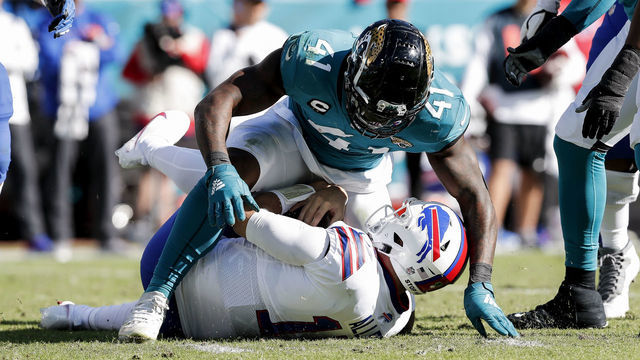 JACKSONVILLE, FL - NOVEMBER 7: Linebacker Josh Allen #41 of the Jacksonville Jaguars makes a sack on Quarterback Josh Allen #17 of the Buffalo Bills during the 2nd quarter of the game at TIAA Bank Field on November 7, 2021 in Jacksonville, Florida. The sack makes the first time in NFL history that a quarterback was sacked by someone with the same name.