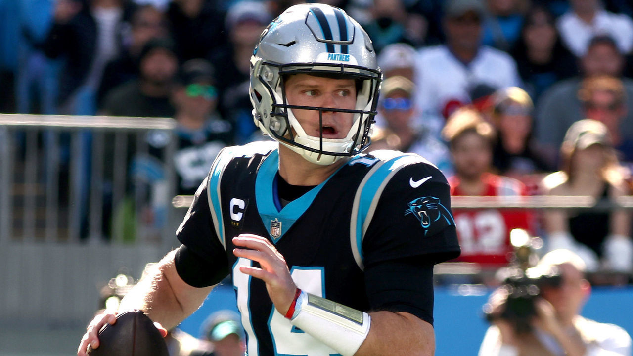 CHARLOTTE, NORTH CAROLINA - NOVEMBER 07: Sam Darnold #14 of the Carolina Panthers looks to throw the ball during the first quarter against the New England Patriots at Bank of America Stadium on November 07, 2021 in Charlotte, North Carolina.