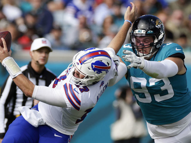 Buffalo Bills safety Jaquan Johnson (4) runs on the field during the second  half an NFL