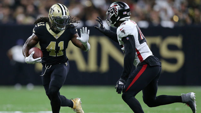 NEW ORLEANS, LOUISIANA - NOVEMBER 07: Alvin Kamara #41 of the New Orleans Saints runs the ball while defended by Deion Jones #45 of the Atlanta Falcons during the third quarter at Caesars Superdome on November 07, 2021 in New Orleans, Louisiana.