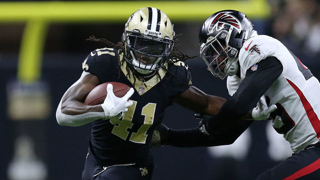 NEW ORLEANS, LOUISIANA - NOVEMBER 07: Alvin Kamara #41 of the New Orleans Saints runs the ball while defended by Deion Jones #45 of the Atlanta Falcons during the third quarter at Caesars Superdome on November 07, 2021 in New Orleans, Louisiana.