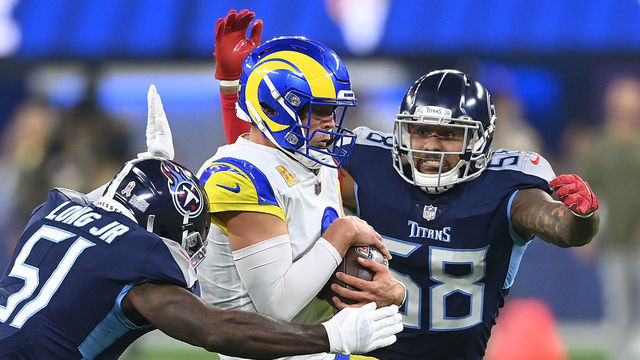 INGLEWOOD, CALIFORNIA - NOVEMBER 07: David Long #51 and Harold Landry #58 of the Tennessee Titans tackle Matthew Stafford #9 of the Los Angeles Rams during the first quarter at SoFi Stadium on November 07, 2021 in Inglewood, California.