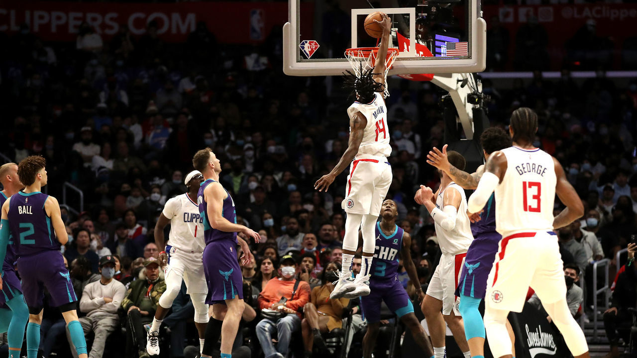 LOS ANGELES, CALIFORNIA - NOVEMBER 07: Terance Mann #14 of the Los Angeles Clippers dunks the ball during the fourth quarter against the Charlotte Hornets at Staples Center on November 07, 2021 in Los Angeles, California.