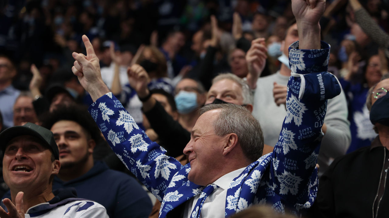 TORONTO, ON - NOVEMBER 04: Toronto Maple Leaf Fans celebrate the equalizing goal late in the third period by Toronto Maple Leafs Center John Tavares (91) during the NHL regular season game between the Tampa Bay Lighting and the Toronto Maple Leafs on November 4, 2021, at Scotiabank Arena in Toronto, ON, Canada.