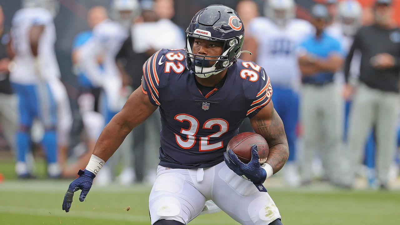 CHICAGO, ILLINOIS - OCTOBER 03: David Montgomery #32 of the Chicago Bears runs for a touchdown against the Detroit Lions at Soldier Field on October 03, 2021 in Chicago, Illinois. The Bears defeated the Lions 24-14.