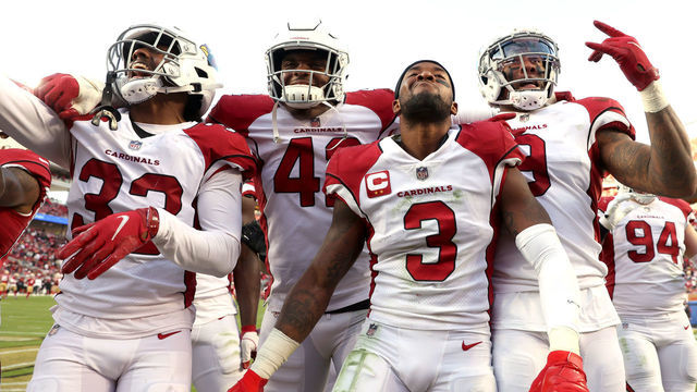 SANTA CLARA, CALIFORNIA - NOVEMBER 07: Budda Baker #3 of the Arizona Cardinals celebrates with teammates after making an interception during the fourth quarter against the San Francisco 49ers at Levi's Stadium on November 07, 2021 in Santa Clara, California.