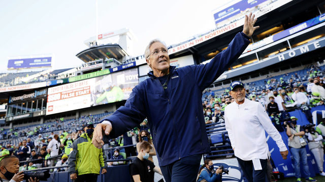 SEATTLE, WASHINGTON - OCTOBER 07: Head coach Pete Carroll of the Seattle Seahawks walks onto the field during warm ups before the start of the Seahawks and Los Angeles Rams game at Lumen Field on October 07, 2021 in Seattle, Washington.
