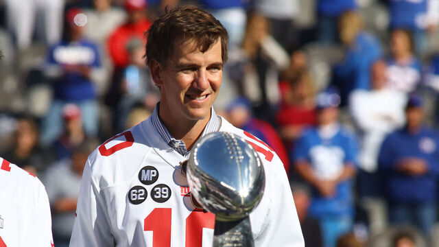 EAST RUTHERFORD, NEW JERSEY - OCTOBER 17: Former New York Giants Eli Manning looks on during a ceremony to honor the 2011 Super Bowl championship team at MetLife Stadium on October 17, 2021 in East Rutherford, New Jersey. Los Angeles Rams defeated the New York Giants 38-11.