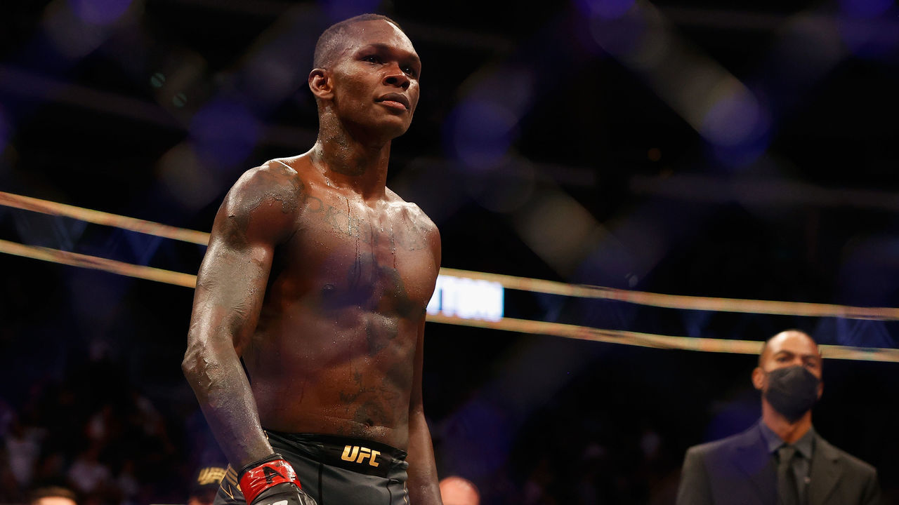GLENDALE, ARIZONA - JUNE 12: Israel Adesanya of Nigeria reacts after defeating Marvin Vettori of Italy by unanimous decision to win the middleweight championship during UFC 263 at Gila River Arena on June 12, 2021 in Glendale, Arizona.