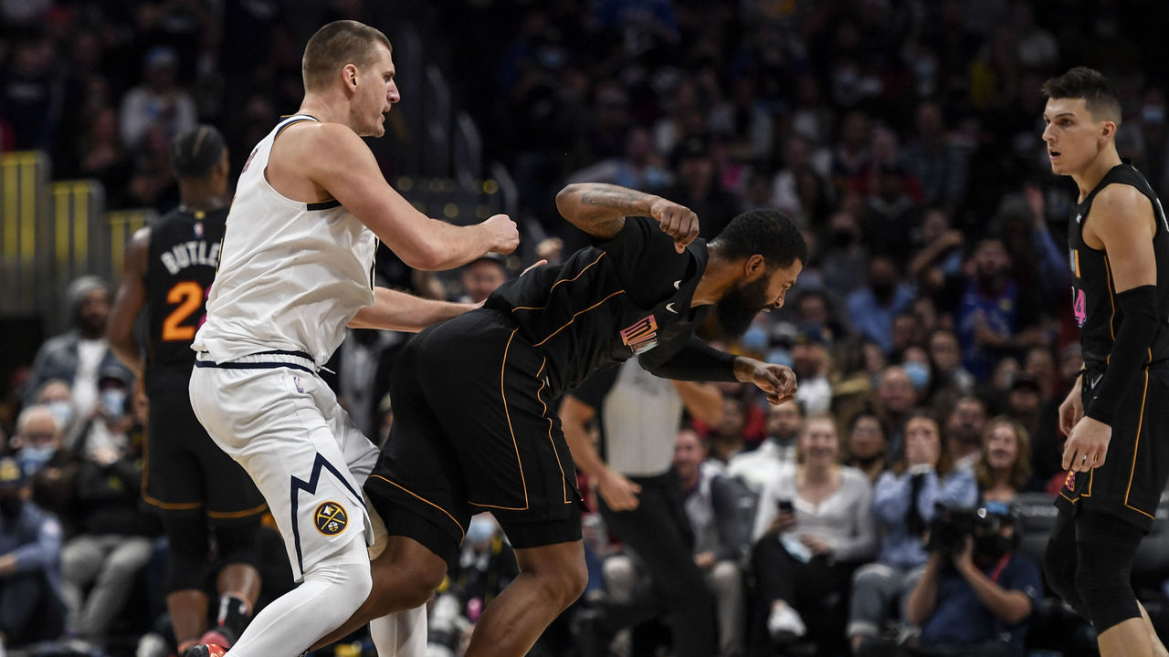 DENVER, CO - NOVEMBER 8: Nikola Jokic (15) of the Denver Nuggets hits Markieff Morris (8) of the Miami Heat with a retaliatory blow after Morris bumped Jokic near mid court during the fourth quarter of Denver"u2019s 113-96 win on Monday, November 8, 2021. The altercation resulted in an ejection for Jokic and a flagrant and two for Morris.
