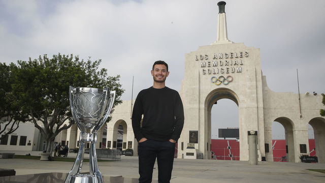 LOS ANGELES, CALIFORNIA - NOVEMBER 09: The 2021 NASCAR Cup Series championship driver, Kyle Larson poses for photos at the Los Angeles Memorial Coliseum on November 09, 2021 in Los Angeles, California.