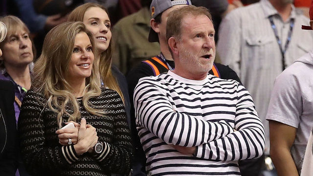 PHOENIX, ARIZONA - MARCH 04: Robert Sarver (C), owner of the Phoenix Suns, and wife Penny watch the final moments of the NBA game against the Milwaukee Bucks at Talking Stick Resort Arena on March 04, 2019 in Phoenix, Arizona. The Suns defeated the Bucks 114-105.