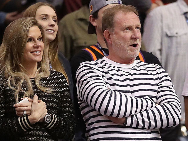 PHOENIX, ARIZONA - MARCH 04: Robert Sarver (C), owner of the Phoenix Suns, and wife Penny watch the final moments of the NBA game against the Milwaukee Bucks at Talking Stick Resort Arena on March 04, 2019 in Phoenix, Arizona. The Suns defeated the Bucks 114-105.