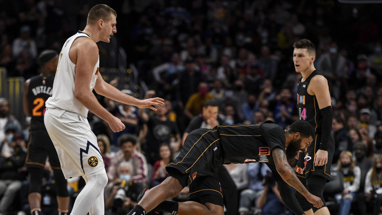 DENVER, CO - NOVEMBER 8: Nikola Jokic (15) of the Denver Nuggets hits Markieff Morris (8) of the Miami Heat with a retaliatory blow after Morris bumped Jokic near mid court during the fourth quarter of Denver"u2019s 113-96 win on Monday, November 8, 2021. The altercation resulted in an ejection for Jokic and a flagrant and two for Morris.