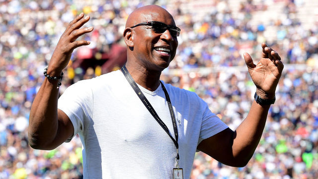 LOS ANGELES, CA - OCTOBER 08: Former Los Angeles Rams Eric Dickerson laugh on the sidelines during a stop in play in a game between the Seattle Seahawks and the Los Angeles Rams at Los Angeles Memorial Coliseum on October 8, 2017 in Los Angeles, California.