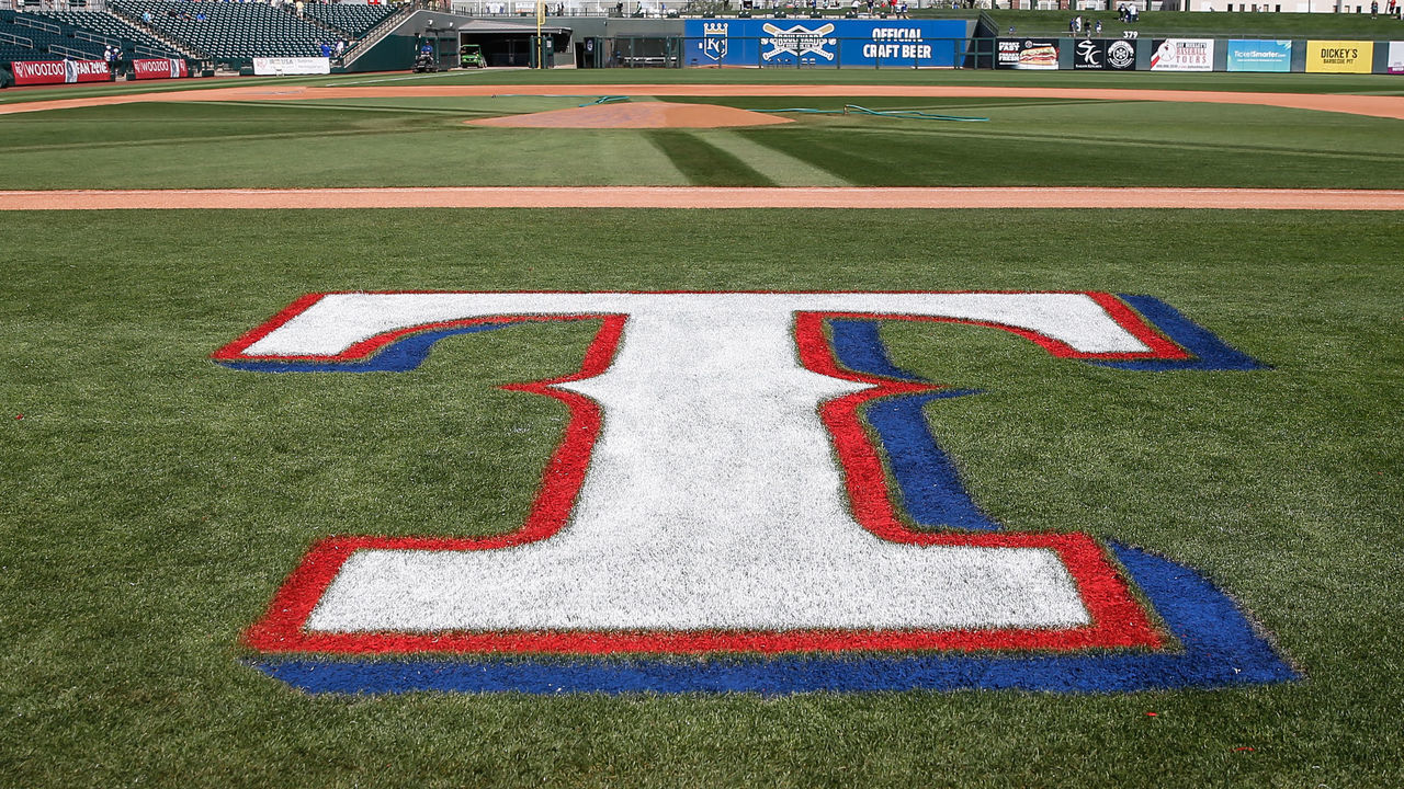 SURPRISE, AZ - MARCH 08: The Texas Rangers logo on the field before the spring training MLB baseball game between the Los Angeles Dodgers and the Texas Rangers on March 8, 2020 at Surprise Stadium in Surprise, Arizona.