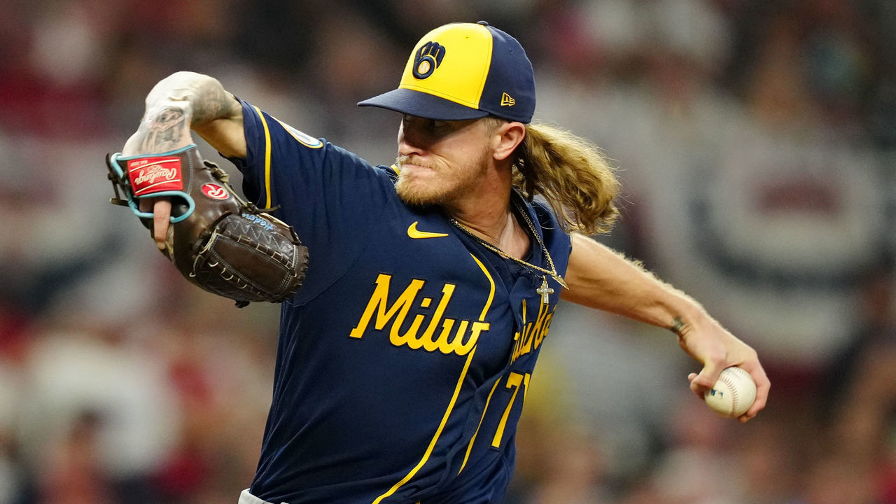 ATLANTA, GA - OCTOBER 12: Josh Hader #71 of the Milwaukee Brewers pitches in the bottom of the eighth inning during Game 4 of the NLDS between the Milwaukee Brewers and the Atlanta Braves at Truist Park on Tuesday, October 12, 2021 in Atlanta, Georgia.