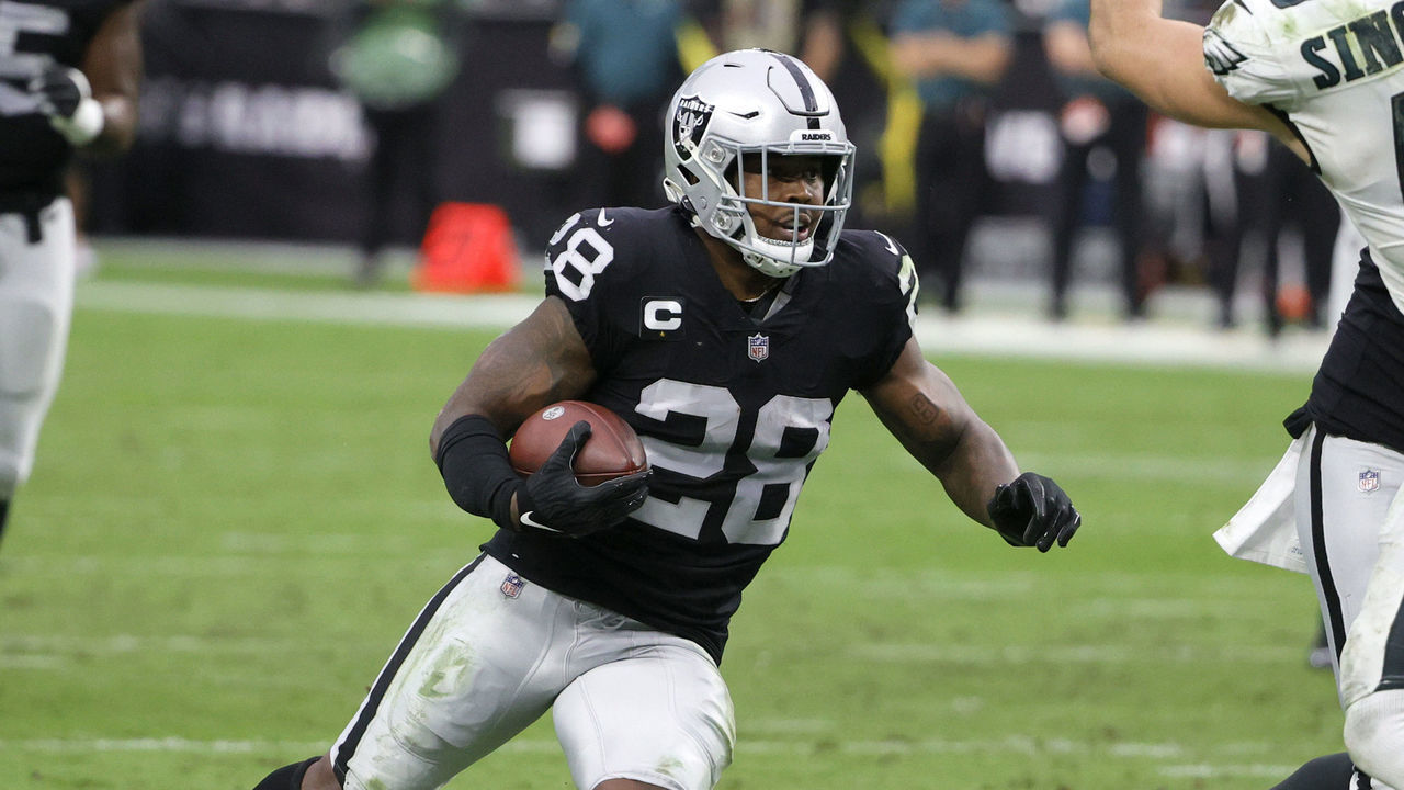 LAS VEGAS, NEVADA - OCTOBER 24: Running back Josh Jacobs #28 of the Las Vegas Raiders runs against the Philadelphia Eagles during their game at Allegiant Stadium on October 24, 2021 in Las Vegas, Nevada. The Raiders defeated the Eagles 33-22.