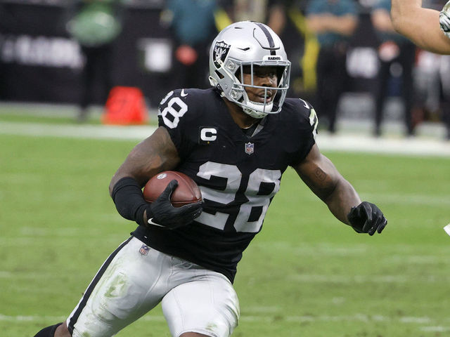 LAS VEGAS, NEVADA - OCTOBER 24: Running back Josh Jacobs #28 of the Las Vegas Raiders runs against the Philadelphia Eagles during their game at Allegiant Stadium on October 24, 2021 in Las Vegas, Nevada. The Raiders defeated the Eagles 33-22.