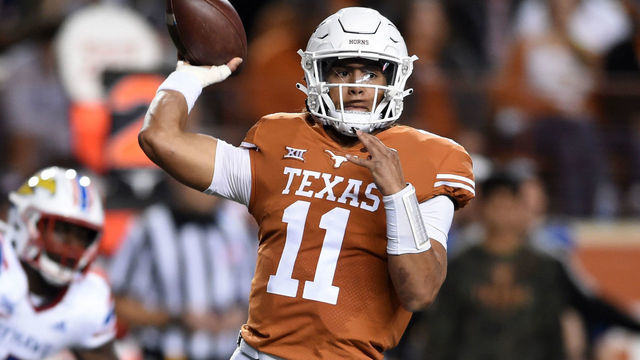 AUSTIN, TX - NOVEMBER 13: Texas Longhorns QB Casey Thompson (11) throws a pass during game between the Kansas Jayhawks and the Texas Longhorns on November 13, 2021 at Darrell K Royal-Texas Memorial Stadium in Austin, TX.