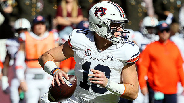COLLEGE STATION, TEXAS - NOVEMBER 06: Bo Nix #10 of the Auburn Tigers rolls out of the pocket against the Texas A&M Aggies at Kyle Field on November 06, 2021 in College Station, Texas.